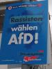 Verändertes Wahlplakat der AfD: Rassisten statt Realisten